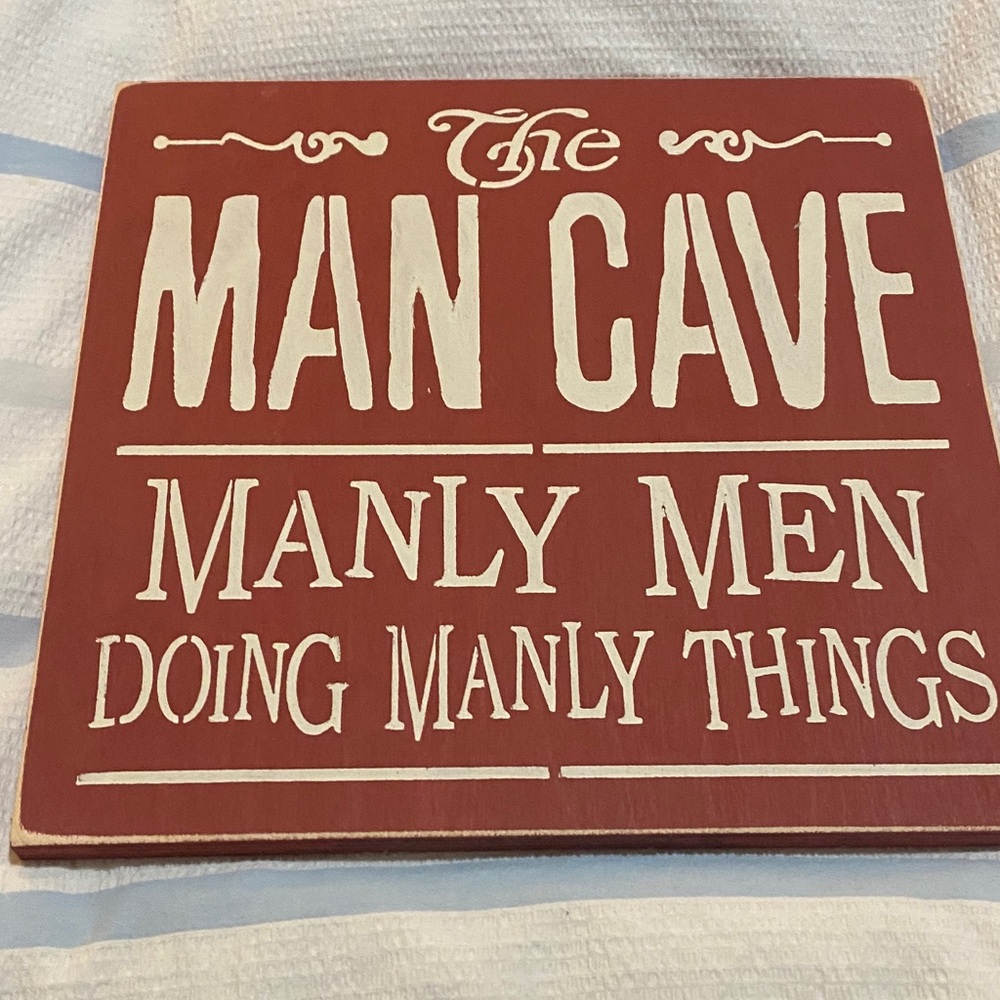 Wooden man cave sign